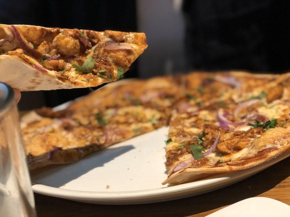 The Original BBQ Chicken Pizza · Created here in 1985. Our legendary BBQ sauce, smoked Gouda, red onions and fresh cilantro transform this original to iconic.
