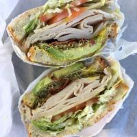 California Sandwich · Turkey, bacon, avocado, Swiss cheese, lettuce sprouts, tomato, mayo, mustard on whole wheat ...