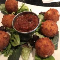 Risotto Croquettes · 6 bite-sized croquettes made with risotto, Parmesan, and provolone cheese. Served with marin...