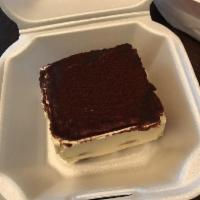 Tiramisu · An Italian dessert with Lady Fingers soaked in espresso alternating with mascarpone cheese a...