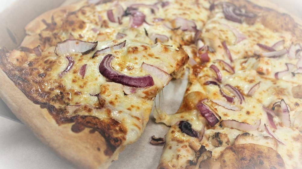 BBQ Chicken Pizza · BBQ Sauce, Grilled Chicken Breast, Red Onions and Mozzarella Cheese.