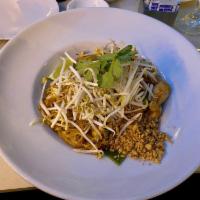 Pad Thai · Stir fried rice noodles with fried egg, bean sprouts, scallions, crushed peanuts and cilantro.