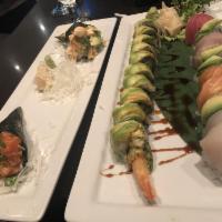 Dragon Roll · Jumbo shrimp tempura, avocado, asparagus, sesame seeds and scallions topped with avocado and...