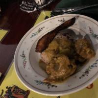 Curried Chicken · A traditional Jamaican favorite. Tender bone-in chicken marinated and braised then stewed in...