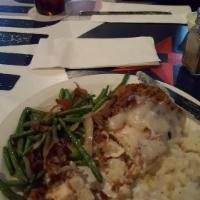 Chicken Fried Chicken · Huge all-natural chicken breast hand breaded and fried to golden perfection and smothered in...