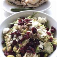 Shaved Brussels and Farro Salad · Dried cranberries, goat cheese, pistachios, parsley, and mustard vinaigrette. Vegetarian.
