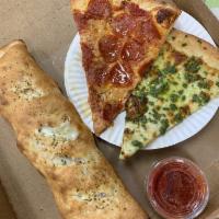 Calzone · Fresh baked pizza dough stuffed with ricotta and extra mozzarella cheese. Served with marina...