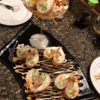 Pink Lady Roll · Soy paper wrap with avocado, crab salad, cucumber, tempura shrimps.
