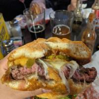 303 Green Chile Relleno Burger · 1st place Denver burger battle 2019. 1/2 lb. cricket burger, white cheddar, house-made chile...