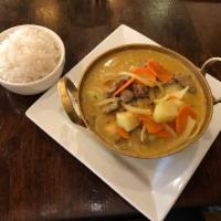Yellow Curry · Coconut curry with red chili paste, peanut, potato, carrot, and onion. (curry base contain f...