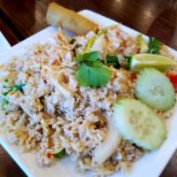 Thai Fried Rice · Thai style fried rice with tomato, green onion, yellow onion, and egg