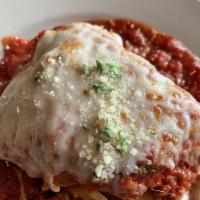 Lasagna · An Italian classic with a traditional meat sauce, baked to perfection. Served with small hou...