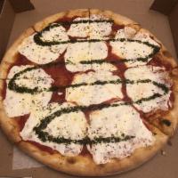 Margherita Pizza · Classic basil, mozzarella and tomato.
