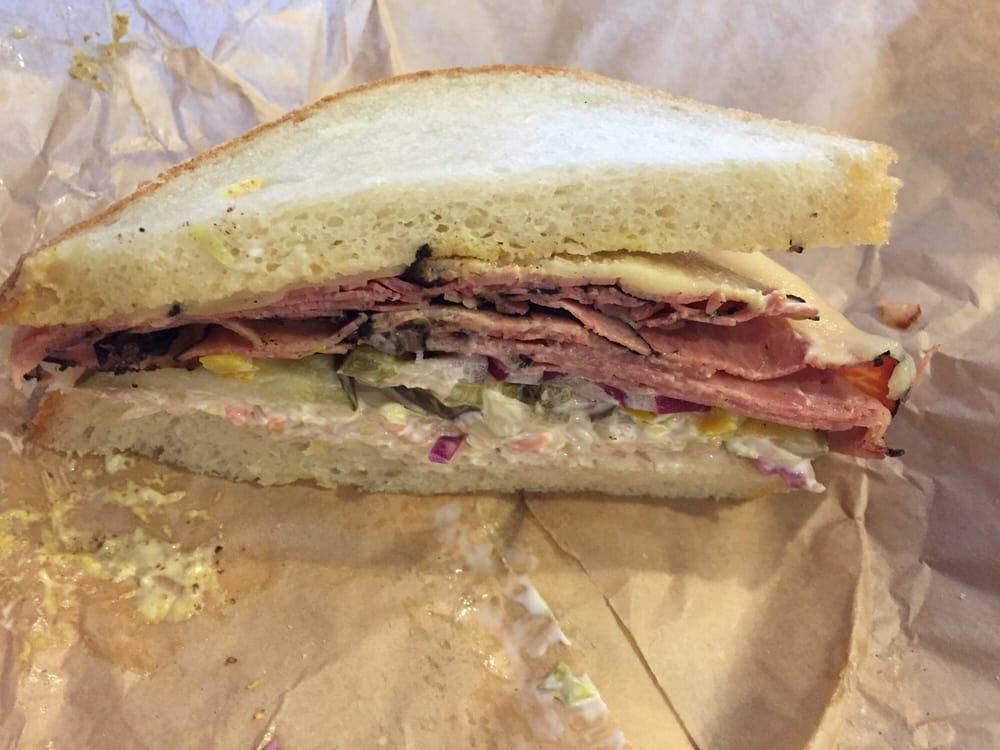 Hot Pastrami Sandwich · Pastrami, Swiss cheese, coleslaw and brown mustard on house bread.