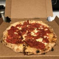 Diavola Pizza · San Marzano tomatoes sauce, fresh mozzarella, spicy soppressata, basil, pecorino and extra v...
