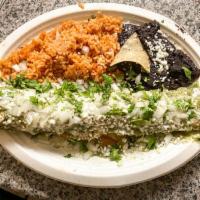 Flautas · Topped with sour cream, avocado salsa and queso fresco. Served with beans and rice.