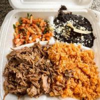 Pork Carnitas · Tender slow roasted pork shoulder made with special ingredients. Served with rice, beans and...