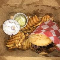 Chopped Brisket Sandwich · Our award-winning brisket, chopped and smothered with our house made sweet and tangy BBQ sau...
