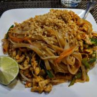 Pad Thai · Rice noodles, egg, carrot, bell pepper, mushroom, scallion, onion, and bean sprout served wi...