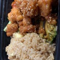 Sesame Chicken · Chunks of chicken breast lightly breaded in semi-sweet tangy sauce sprinkled with sesame seed.