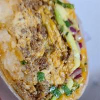 Chorizo Burrito · 3 eggs, cheese, hash browns, onions and cilantro.