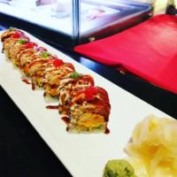 8 New Orleans Roll · Spicy crawfish, avocado on top with spicy tuna, crabmeat, wasabi tobiko and eel sauce