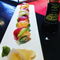 8 Rainbow Roll · Tuna, salmon and white fish wrapped cucumber, avocado, kanikama and fish roe.