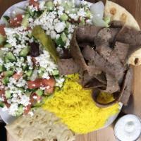 Gyro Plate · Served with seasoned fries, Greek salad, hot pita and fresh cut lamb gyro. Tzatziki and vina...