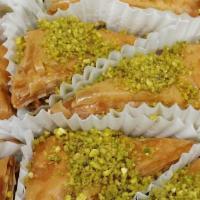 Baklava · Homemade Baklava and garnished with pistachio.