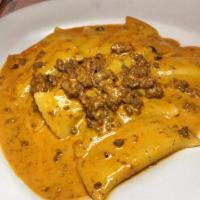 Stuffed Rigatoni Bolognese · 