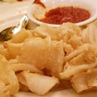 Fried Calamari · Flash fried squid, crunchy on the outside, and simply perfect on the inside. Kick it up a no...