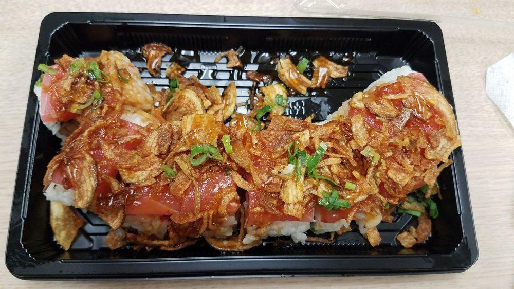 Superman Maki · Our most popular Makimono. A spicy ahi and cucumber uramaki topped with maguro and finished with our lion sauce, fried potato flakes, teriyaki sauce and green onions