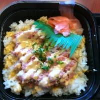 Spicy Ahi Donburi · Sushi rice, spicy ahi, spicy ahi sauce, green onions and ginger.