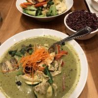 Green Curry · Chicken, eggplants, bell pepper, green beans, basil, and zucchini, cooked with coconut milk
...