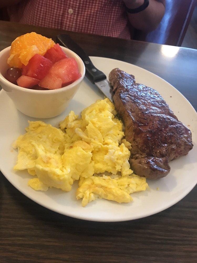 Steak and Eggs · 8 oz. New York steak cooked to your liking, 3 eggs any style and breakfast potatoes, hash browns or fruit.