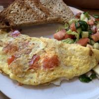 Italian Omelette · Tomato, basil and mozzarella cheese. Served with choice of 2 sides.
