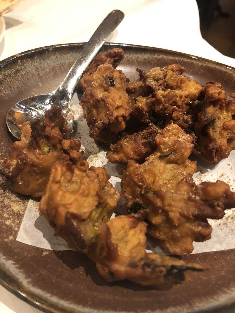 Pakora · All pakoras are dipped in mildly spiced in chick pea batter mixed with garlic, ginger, and spices.