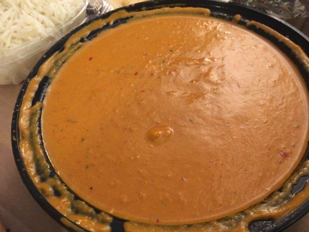 Chicken Tikka Masala Curry · House favorite. Creamy tomato curry with chunks of boneless chicken.