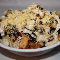 French Fry Chaat Plate · Spiced fries topped with chutneys, tart yogurt and crispy chickpeas.