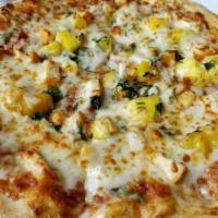 Mango Chicken Pizza · Chicken tikka and chunks of mango sprinkled with cilantro.