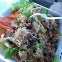 Cheesesteak on Green Salad · Choice of steak or chicken. On romaine lettuce with olives, carrots, and tomato. The protein...