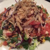 BBQ Chicken Salad · Grilled chicken with corn, black beans, carrots, tomato, green onions, cilantro and crisp co...