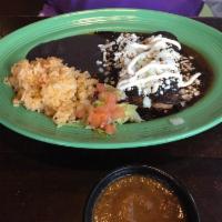 Enchiladas · Topped with monterrey cheese and choice of sauce. Filled with choice of beef picadillo, poll...