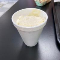 Corn in a Cup · Cooked corn, mayonnaise, cotija cheese, and lime juice.