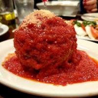 Stuffed Meatball Entree · Our famous softball-sized meatball stuffed with Italian deli meats and cheeses served with a...