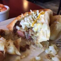 Sonoran Style Hot Dog · Our famous award winning Sonoran style hot dog. Served on our signature bread topped with wh...