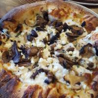 Tuscan Mushroom Pizza · Housemade roasted garlic sauce, mozzarella, cremini, shiitake, and button mushroom, roasted ...