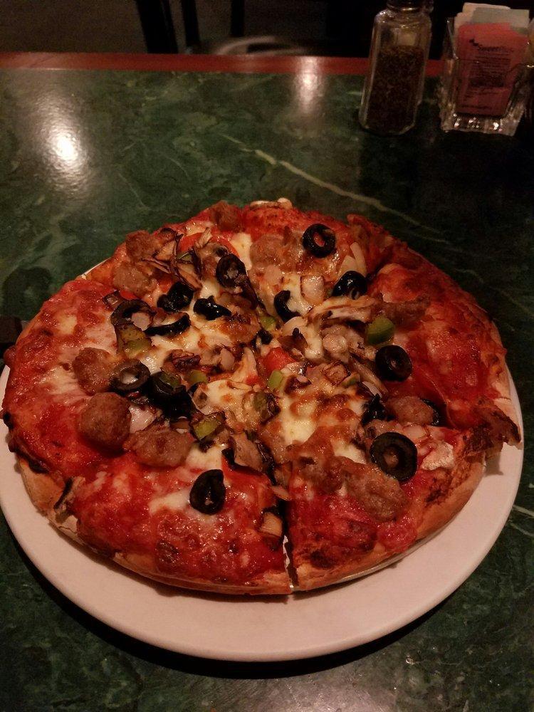 Special Pizza · 6 delicious toppings: pepperoni, sausage, mushrooms, black olives, green peppers and onions.