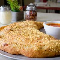 Calzone · Stuffed with ricotta and mozzarella cheeses. Plus your choice of 2 pizza toppings.