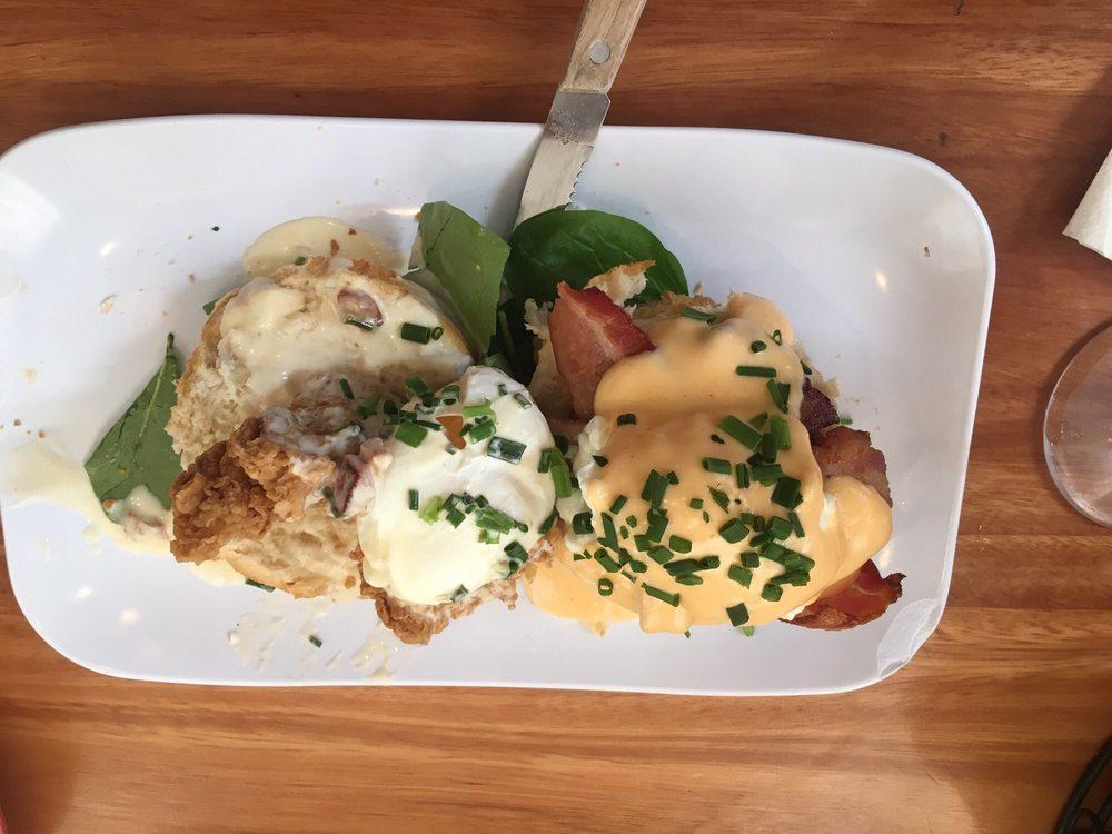 Eggs Blackstone · Applewood-smoked bacon & grilled red tomato over a buttermilk biscuit, topped with two poached eggs and finished with hollandaise